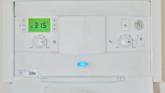 a close-up of a tankless water heater