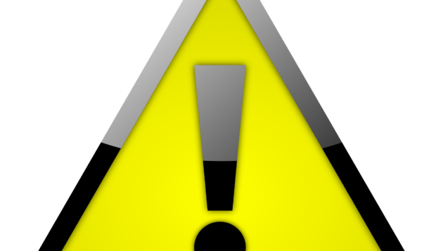 a yellow caution symbol with a black exclamation point