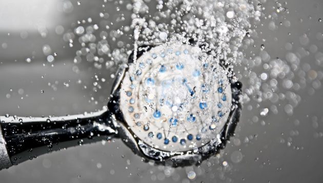 water being sprayed from a showerhead