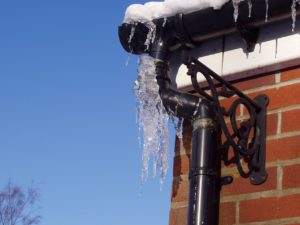 ice frozen on a home's pipes during the winter