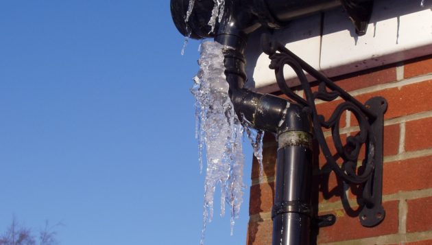 ice frozen on a home's pipes during the winter