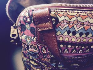 the side of a woman's opened purse