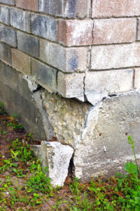 Cracks and breaks in the foundation of a home due to a slab leak
