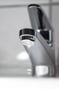 water dripping from a bathroom sink in live oak