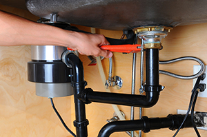 garbage disposal installation services by a San Antonio plumber