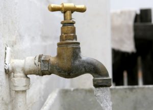 an outdoor water system running water in Cibolo