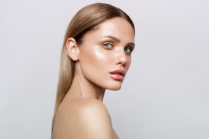 a serious woman staring to the side