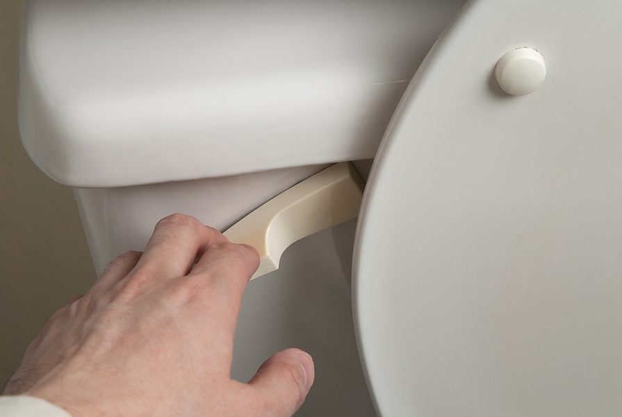 A toilet being flushed in a San Antonio home