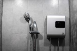 a water heating system on the wall of a Comfort, Texas home